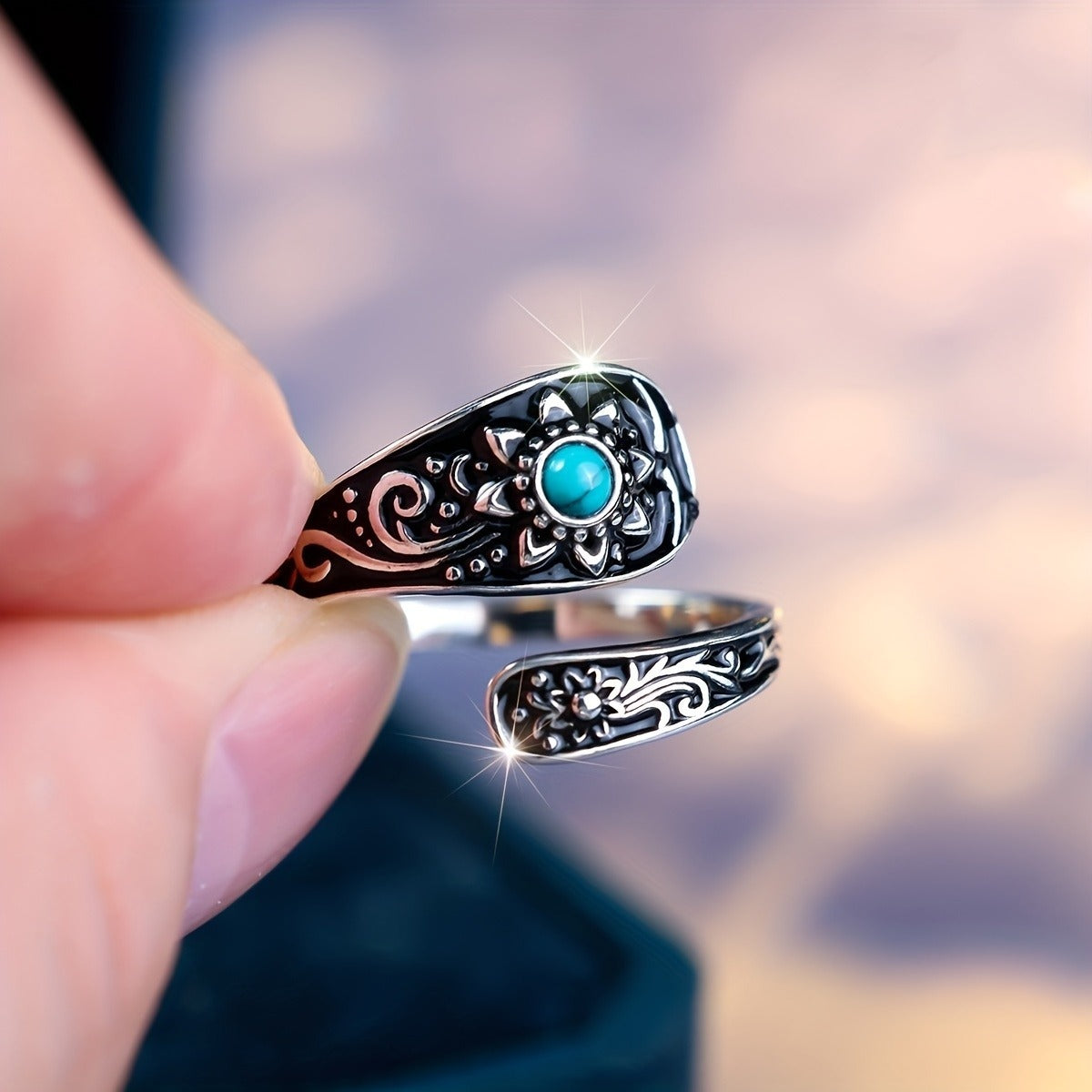 925 silver turquoise sunflower ring from Tree of Life Studio with intricate floral and swirl designs