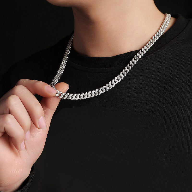 Apex moissanite necklace rivals diamond shown on neck with silver chain design by Tree of Life Studio