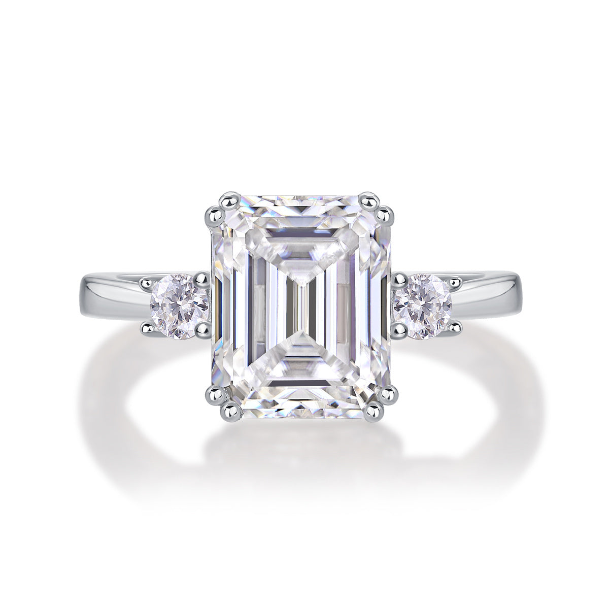 baguette moissanite wedding ring with emerald cut center stone and side round stones