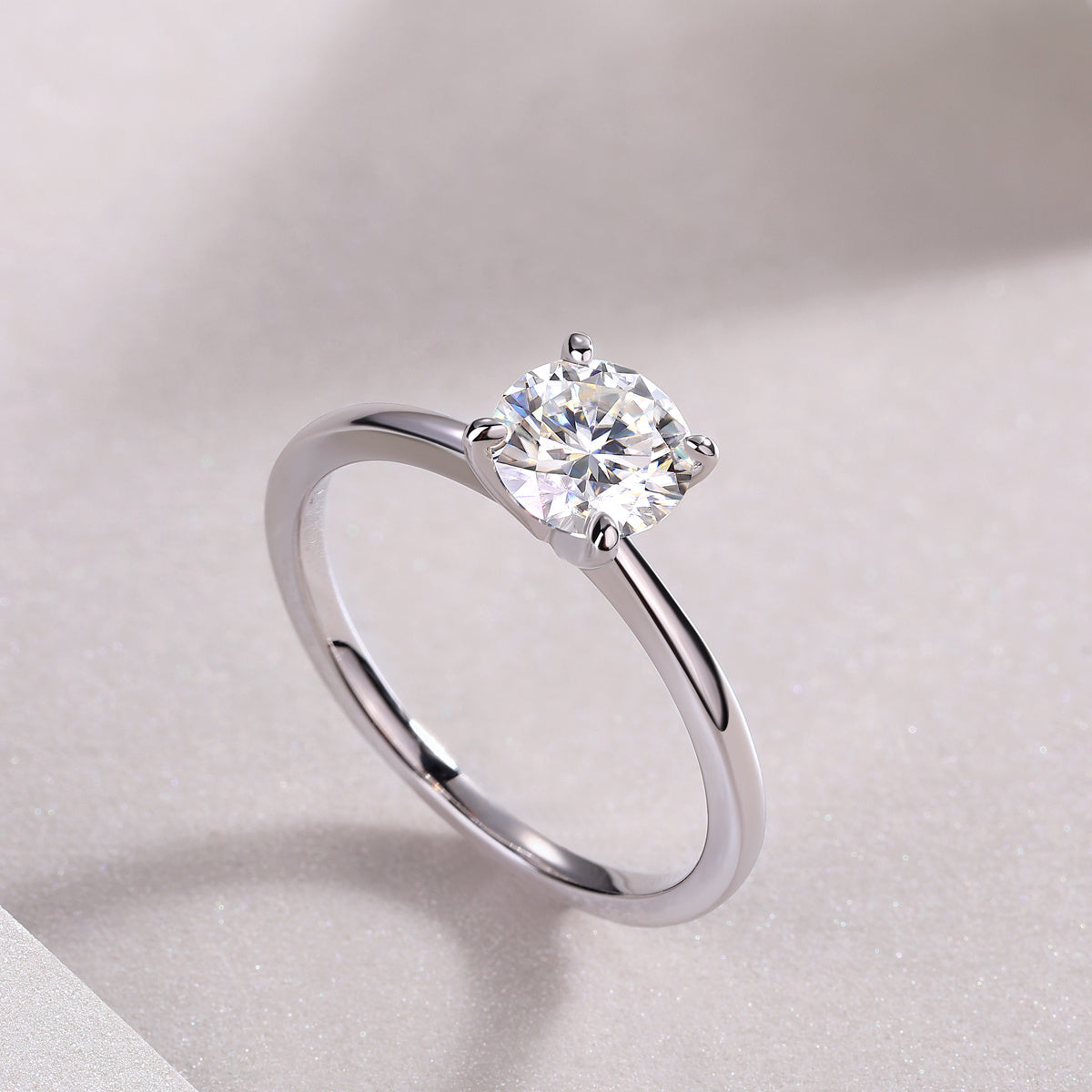 Tree of Life Studio classic moissanite ring for women with a round solitaire stone in a silver band