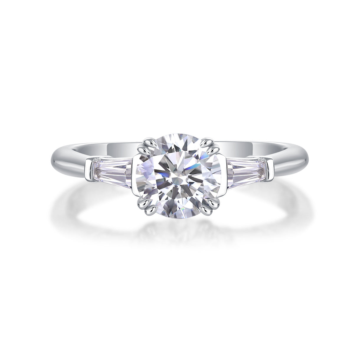 Classic Moissanite silver engagement ring from Tree of Life Studio with round center stone and tapered side stones