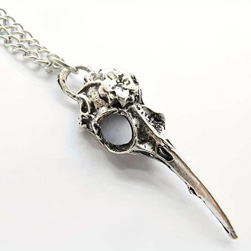 Spiritual Vulture skull necklace pendant in silver tone with detailed bird skull design on a chain