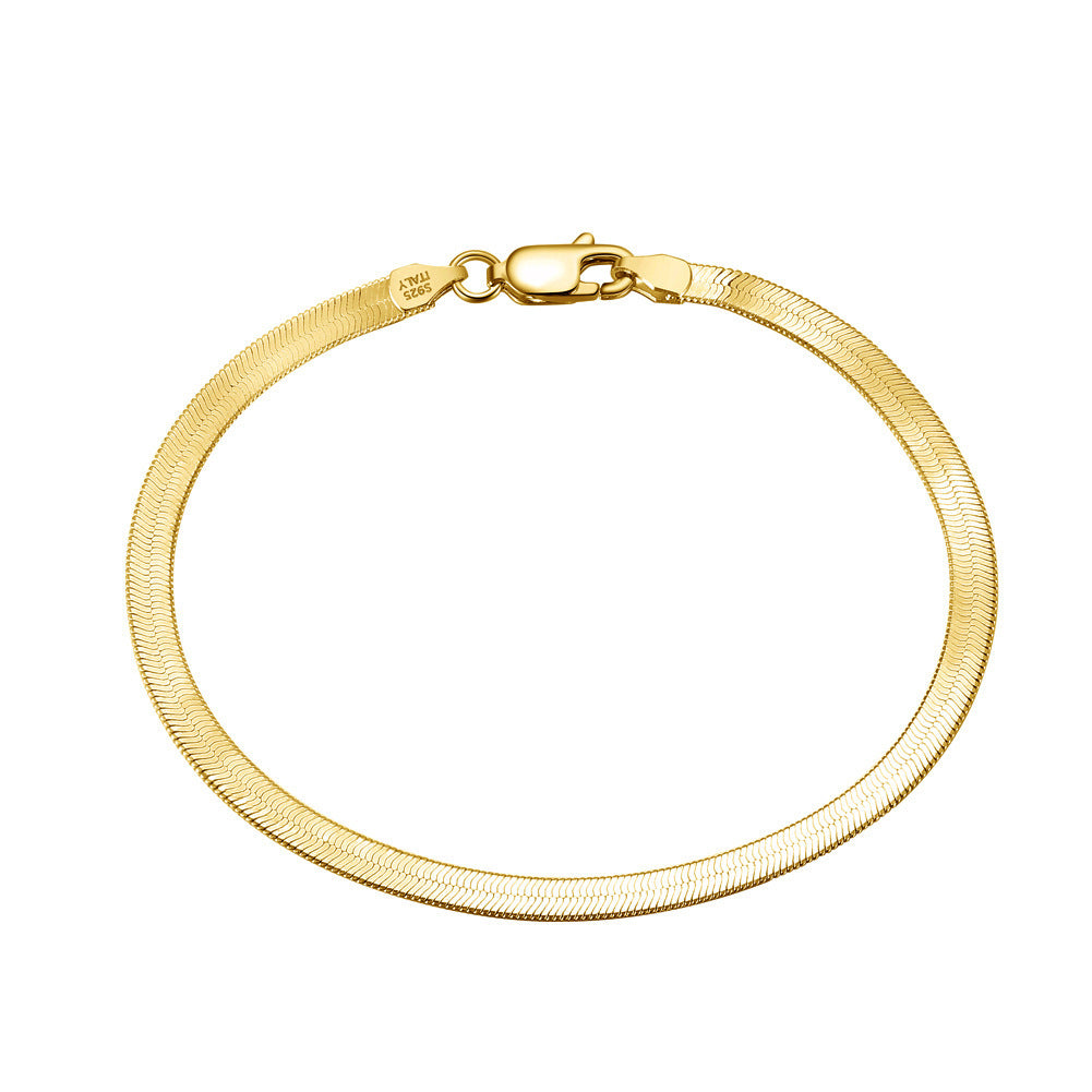 flat snake bone silver bracelet in gold tone with lobster clasp closure