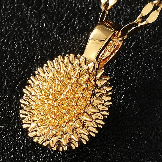 Gold durian pendant necklace for women with detailed spiky texture by Tree of Life Studio