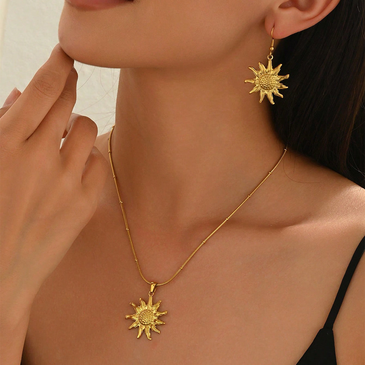 18K gold sun pendant necklace earring set hypoallergenic from Tree of Life Studio worn by woman