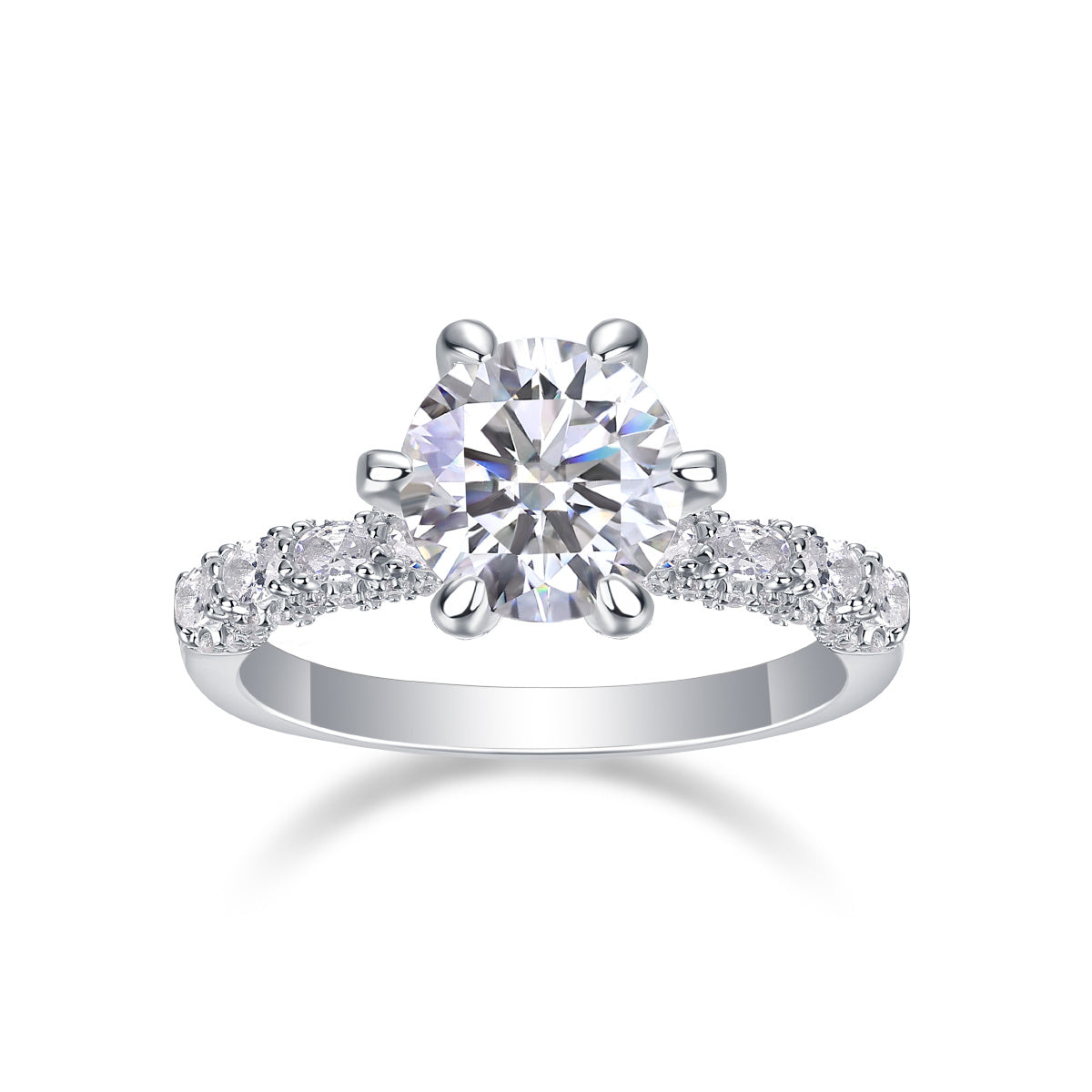 High quality moissanite silver ring with a large center stone and smaller side stones by Tree of Life Studio