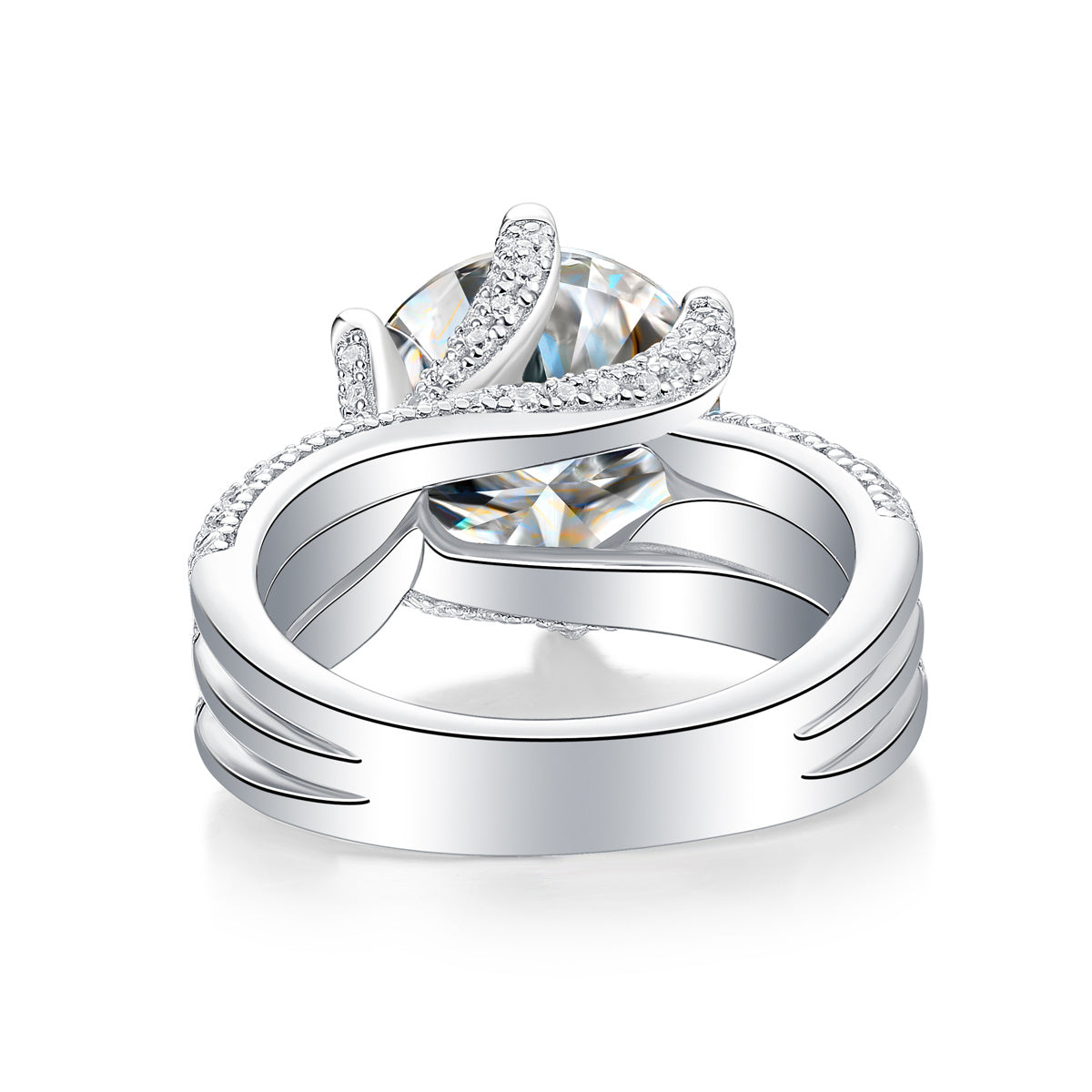 Large silver moissanite ring by Tree of Life Studio with intricate band and sparkling gemstone