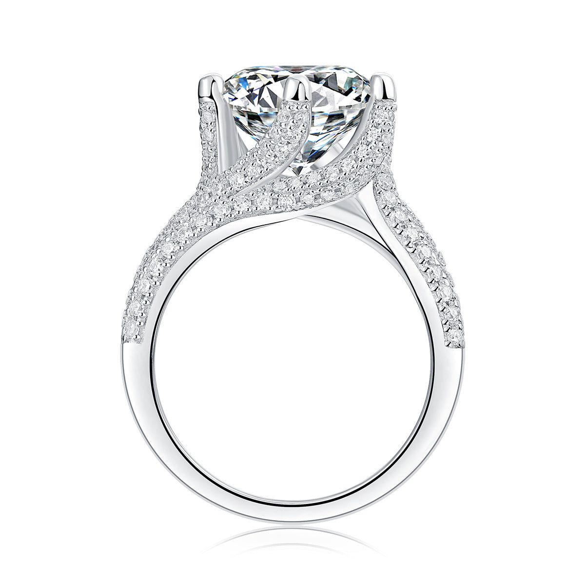 Large silver moissanite ring from Tree of Life Studio with intricate pave diamond detailing