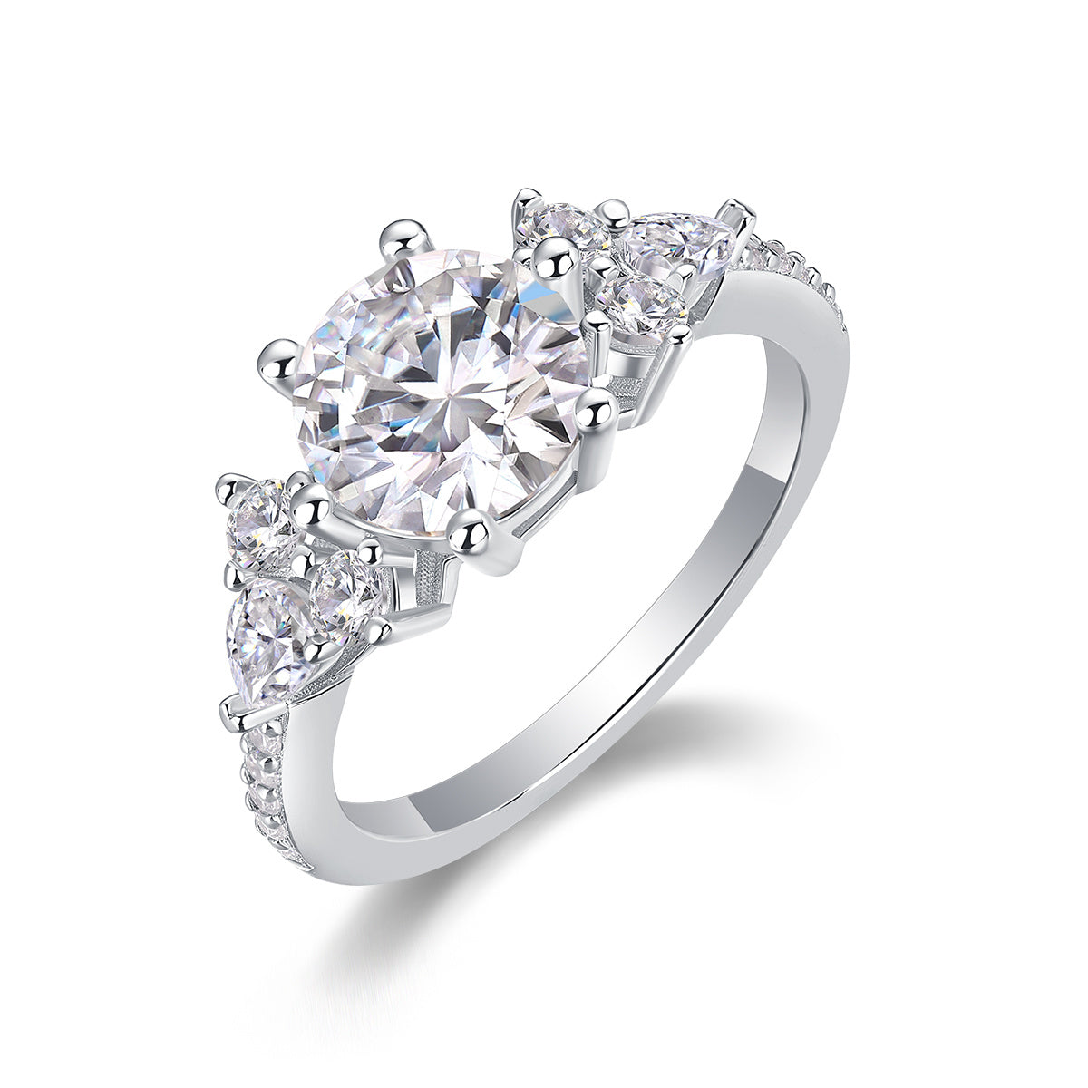 Luxury moissanite engagement ring by Tree of Life Studio with a large center stone and two side stones