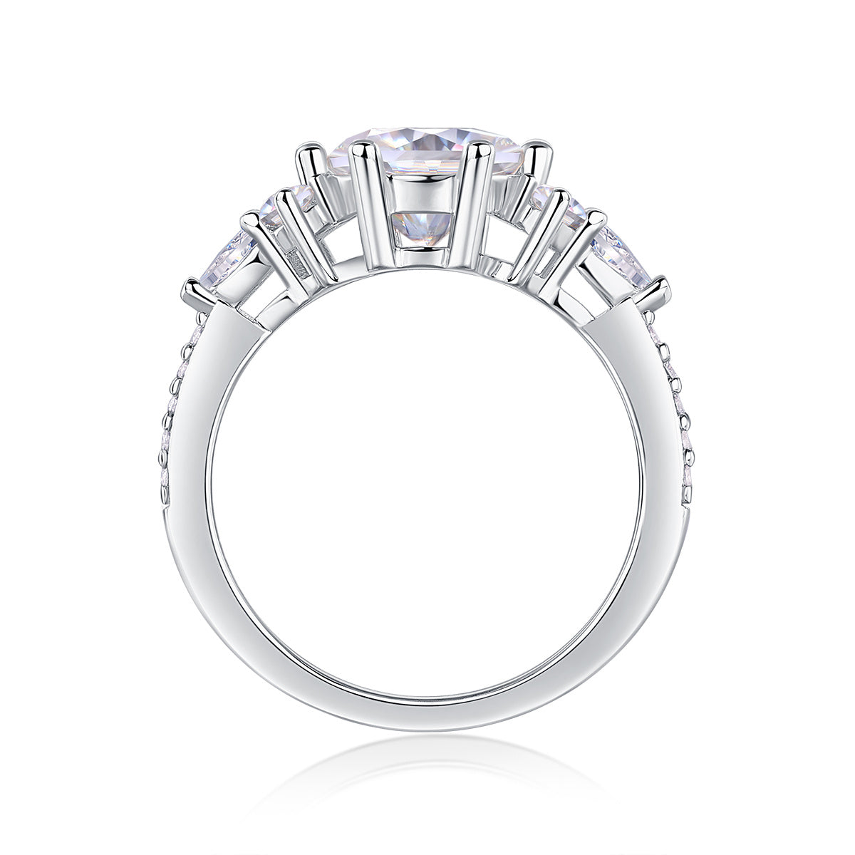 Luxury moissanite engagement ring by Tree of Life Studio with five sparkling stones in silver setting