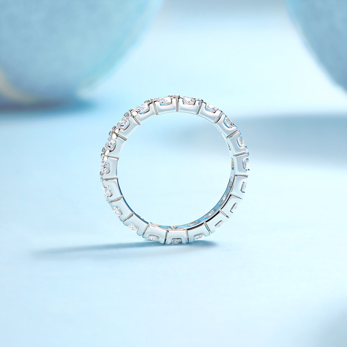 Tree of Life Studio moissanite diamond ring with sparkling stones set in a continuous silver band