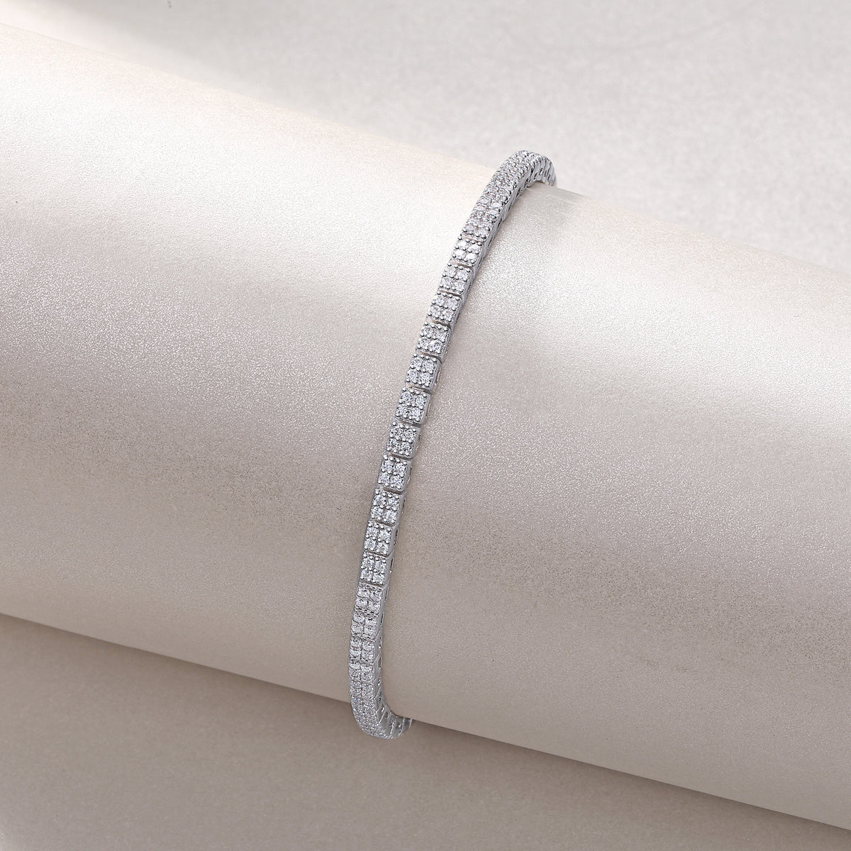 Elegant moissanite diamond tennis bracelet by Tree of Life Studio with sparkling stones in silver setting