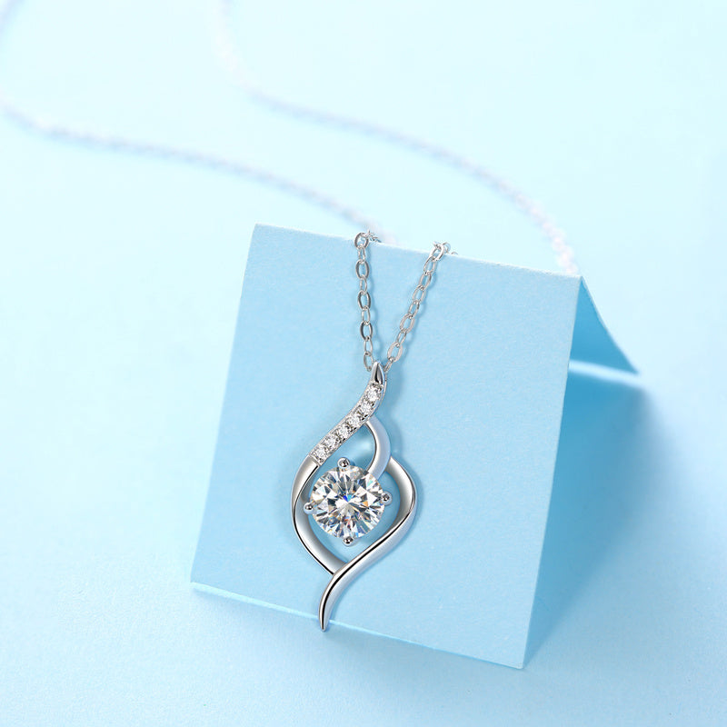 Tree of Life Studio moissanite silver necklace set with round center stone and elegant silver pendant