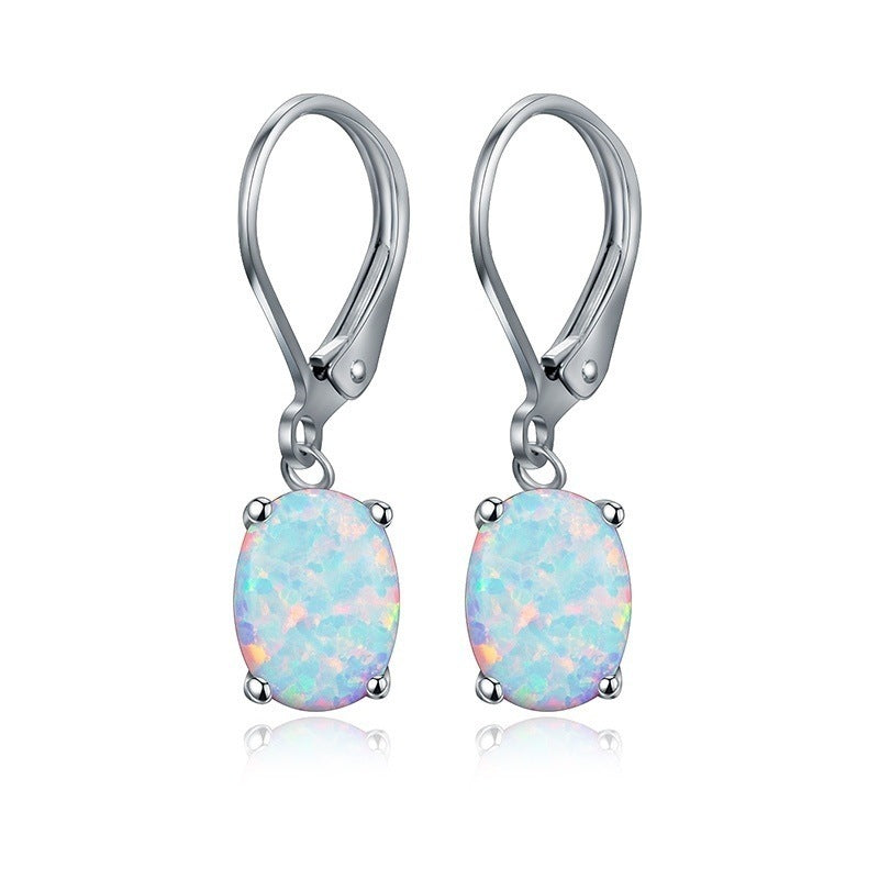 Tree of Life Studio opal drop earrings with oval iridescent opal stones set in silver leverback hooks