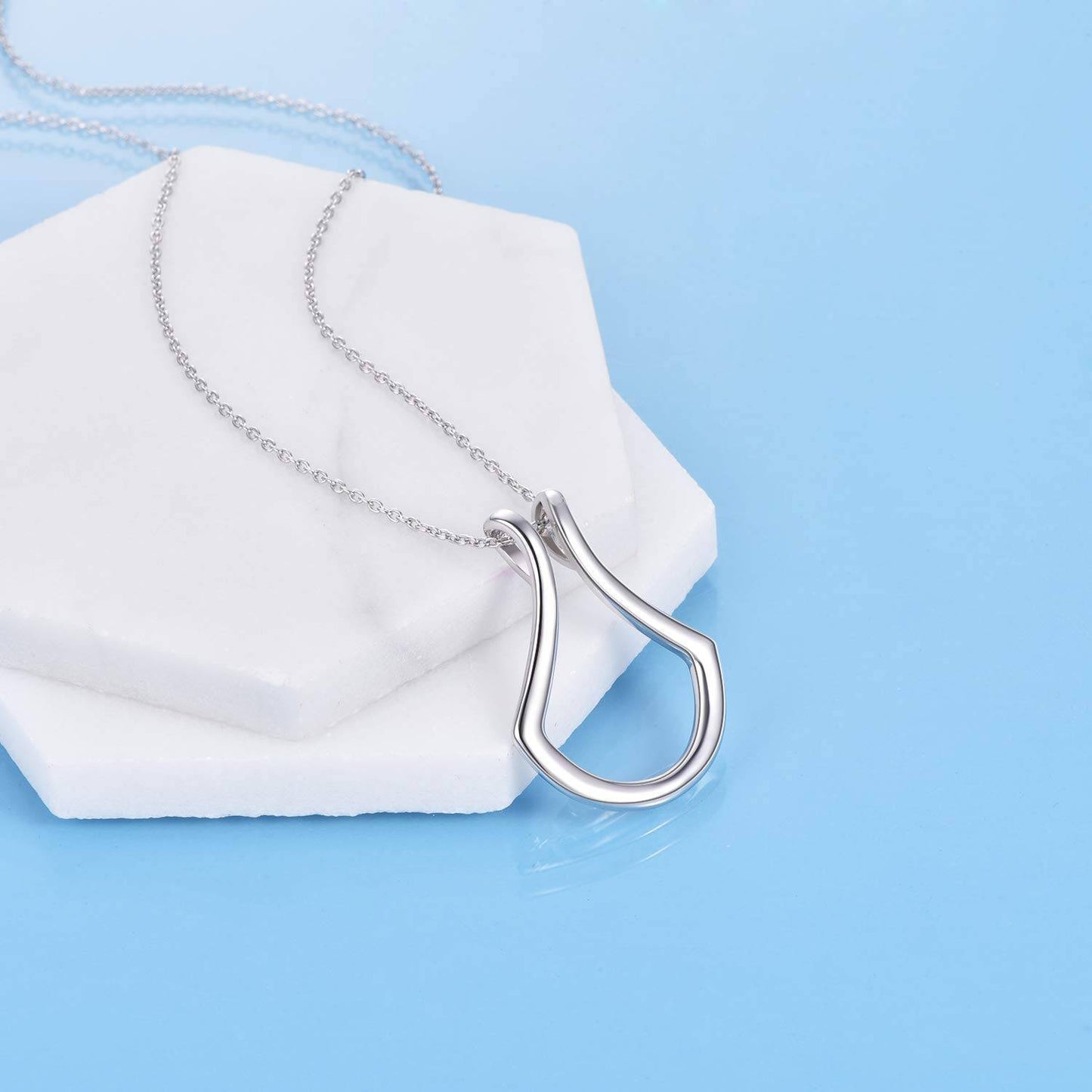 silver pendant necklace for holding rings with a sleek modern design