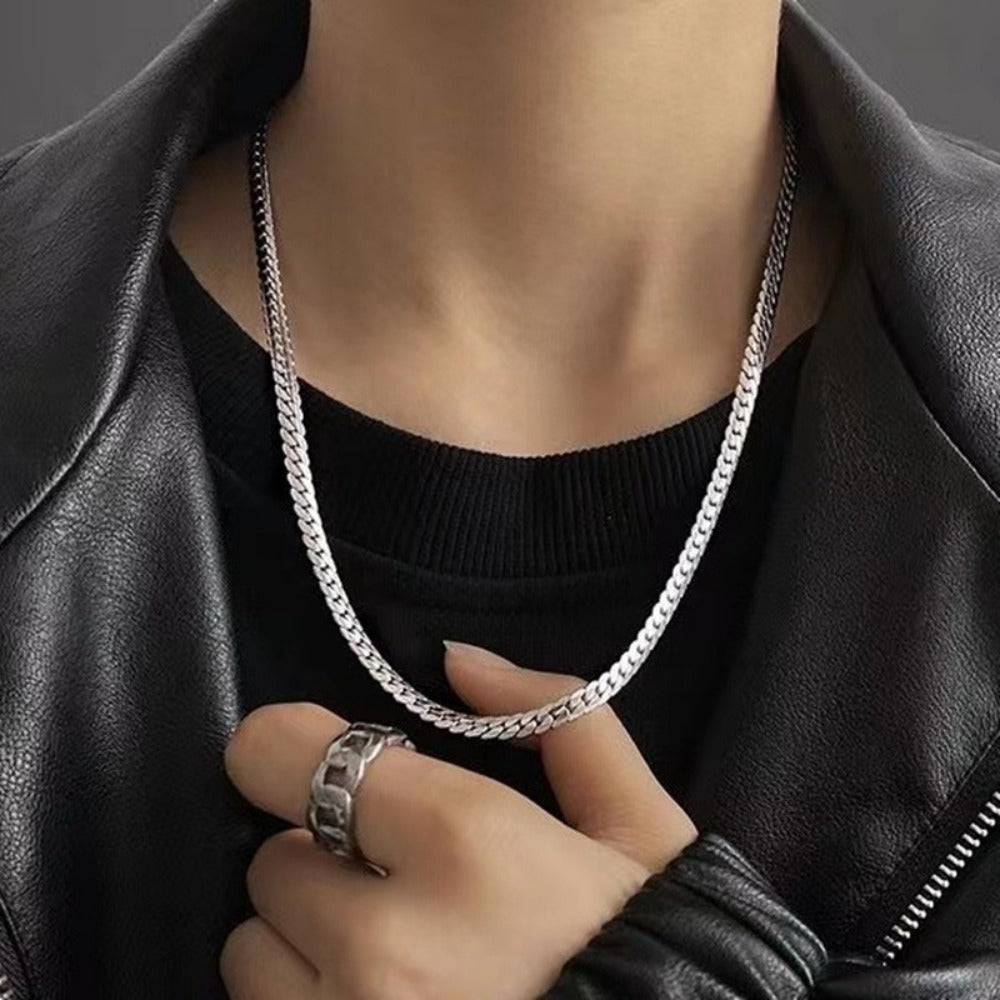 Plated silver men's flat chain necklace tree of life studio worn with black leather jacket and ring