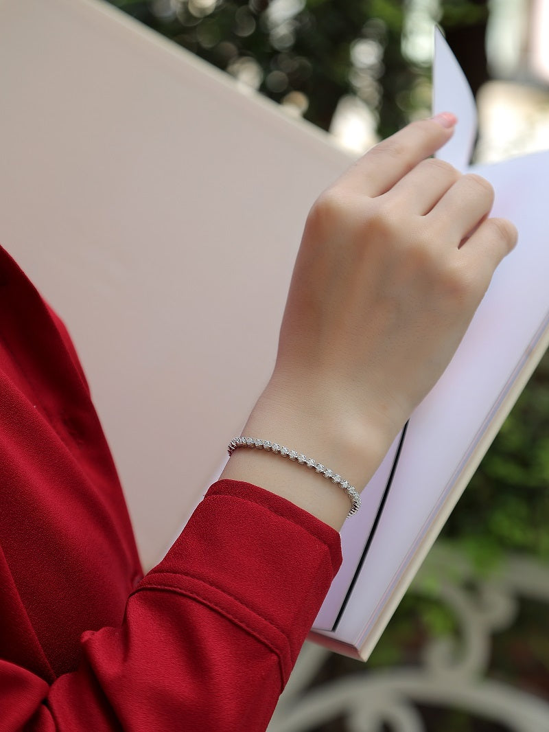 S925 silver moissanite diamond bracelet anklet on wrist with red sleeve by Tree of Life Studio