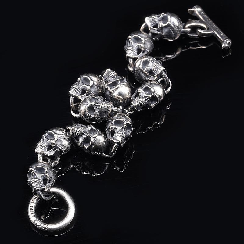 Tree of Life Studio silver spiritual skull charm bracelet with detailed skull links on black background