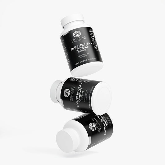 Tree of Life Studio ginkgo biloba and ginseng supplement bottles with black labels floating on white background
