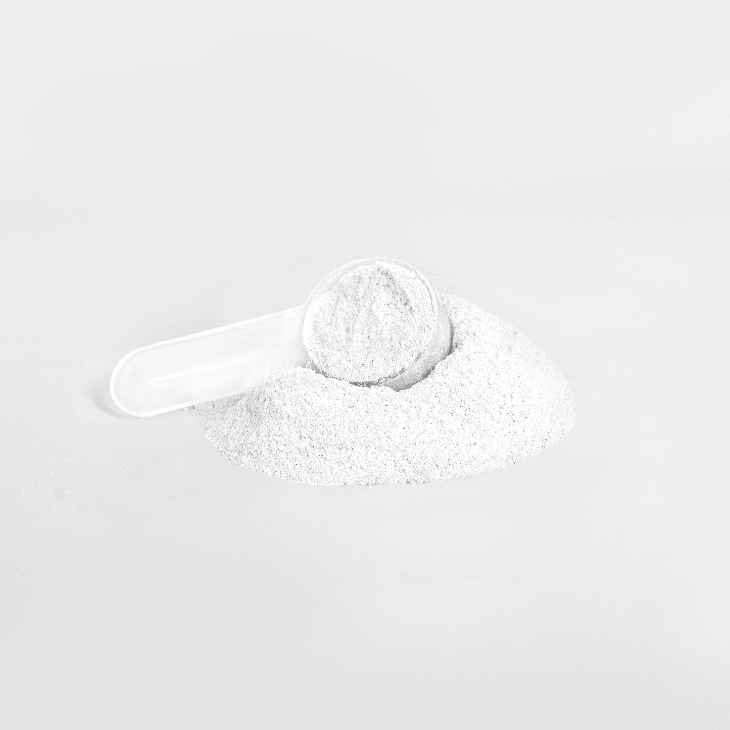 White lychee energy powder with clear scoop from Tree of Life Studio specialty supplements