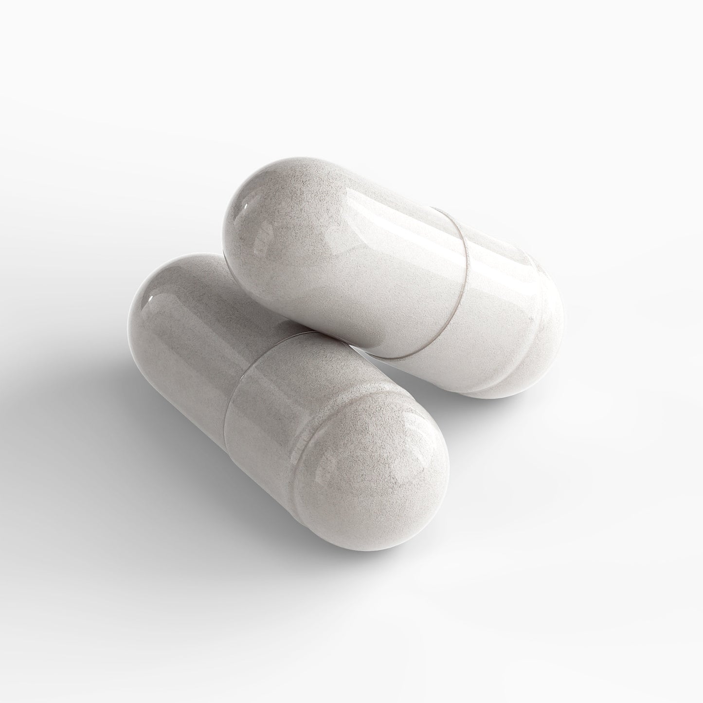 Two clear capsules filled with powder of premium colostrum supplement by Tree of Life Studio