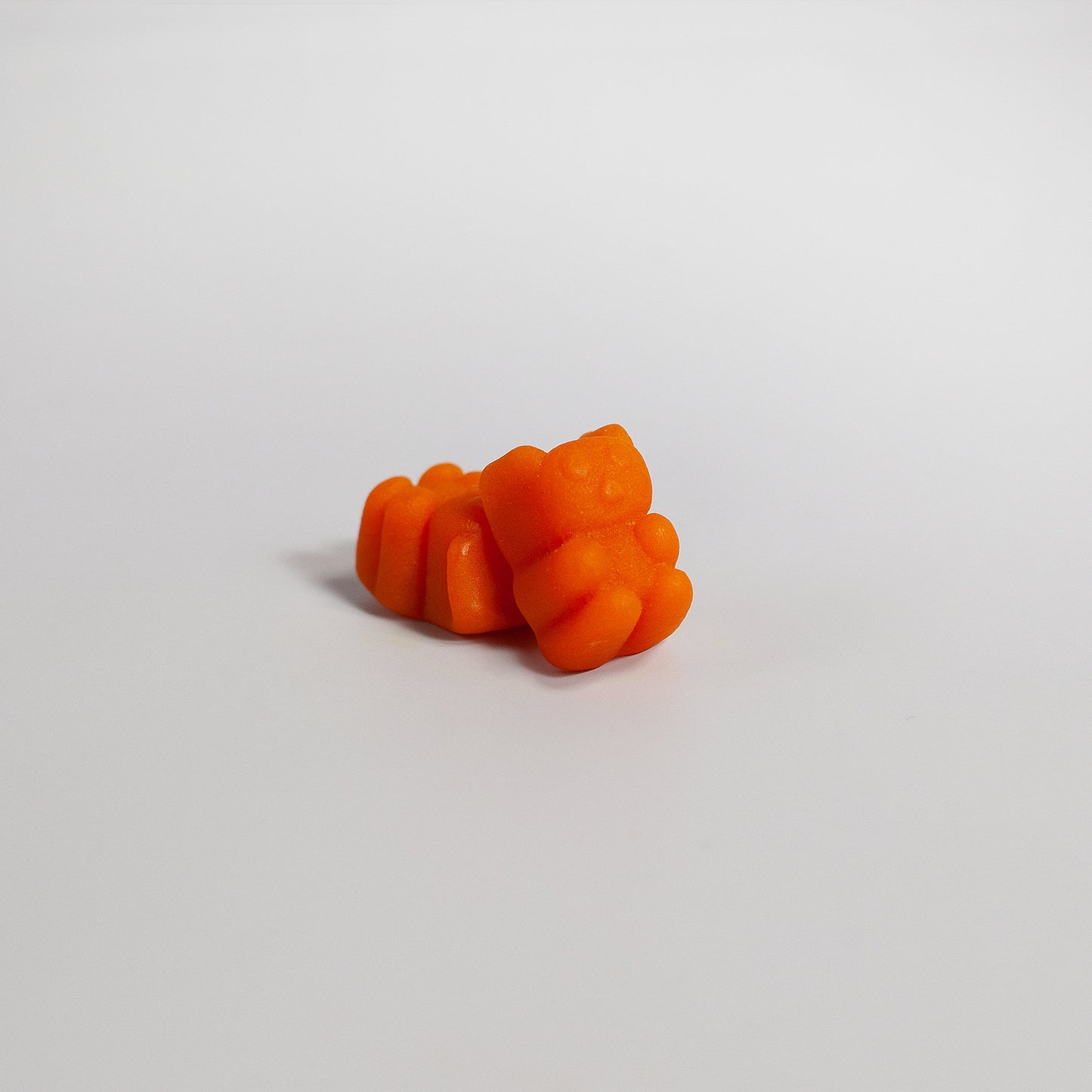 Tree of Life Studio premium turmeric gummies USA shaped like orange bears on white background