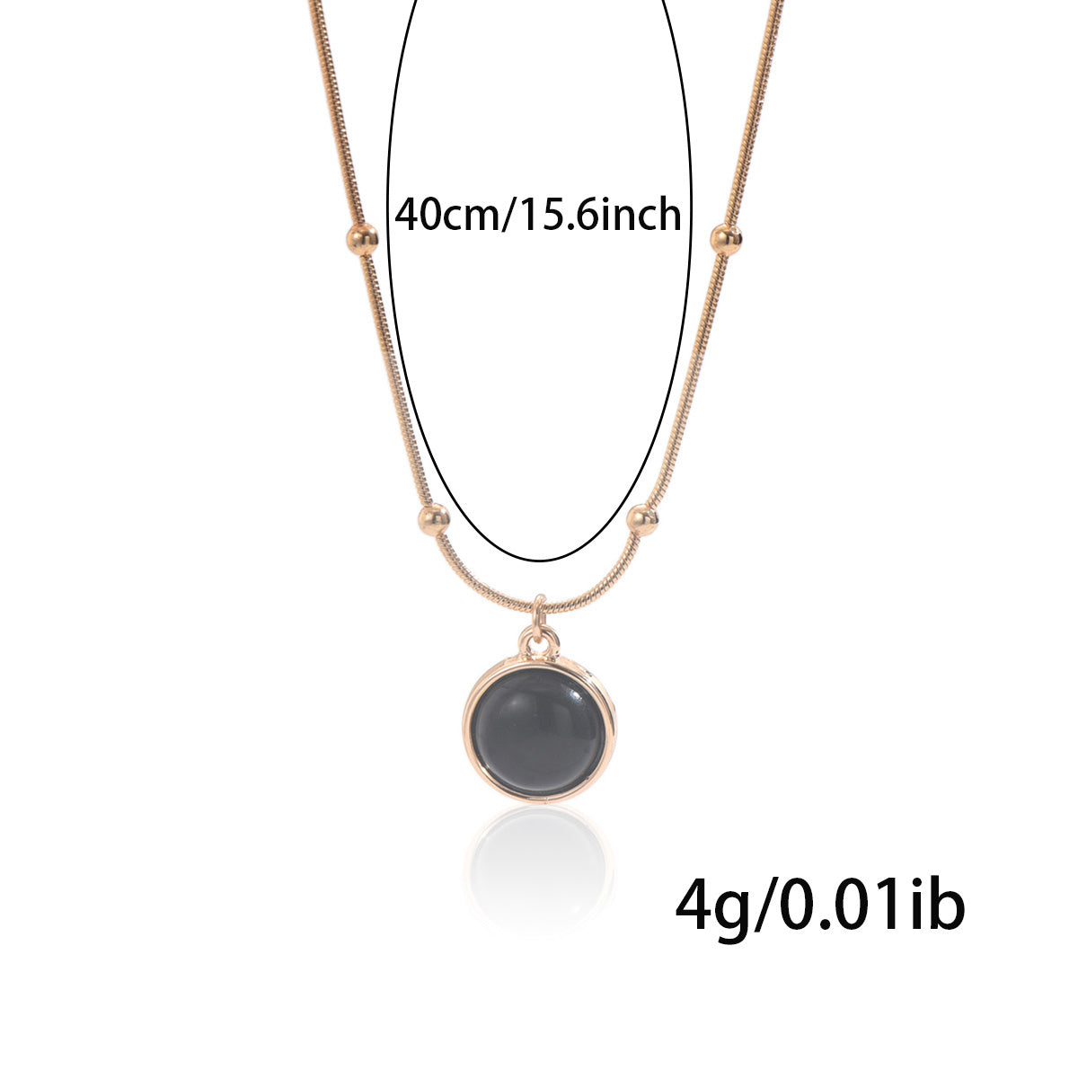 18k gold plated mood necklace by Tree of Life Studio with black circular pendant on gold chain