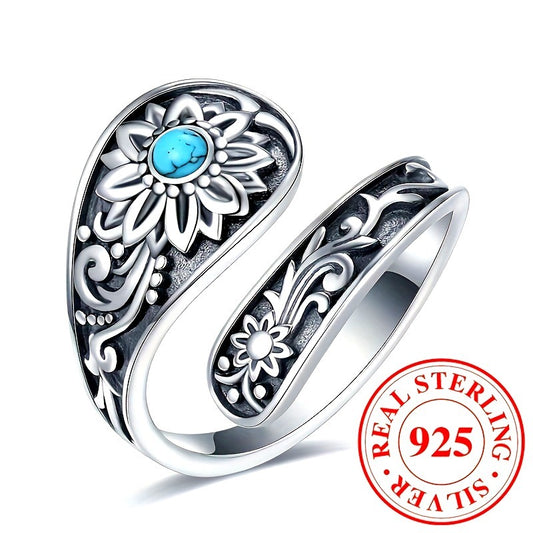 925 silver turquoise sunflower ring from Tree of Life Studio with detailed floral design and adjustable band