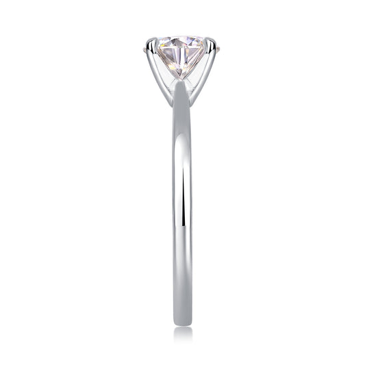 Classic moissanite ring for women by Tree of Life Studio with solitaire sparkling stone and sleek silver band