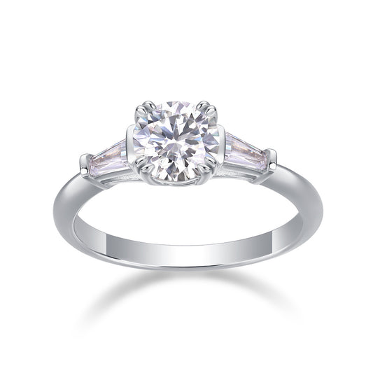 Tree of Life Studio classic Moissanite silver engagement ring with round center stone and tapered side stones