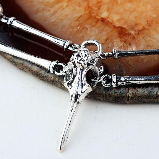 Tree of Life Studio gothic bird skull necklace with detailed silver pendant on black cord