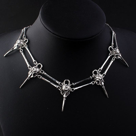 Tree of Life Studio gothic bird skull necklace in silver with detailed skull and bone design