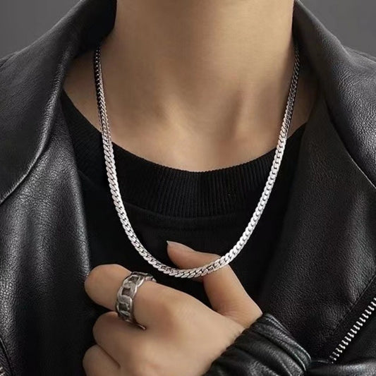 Plated silver men's flat chain necklace tree of life studio worn with black leather jacket and ring