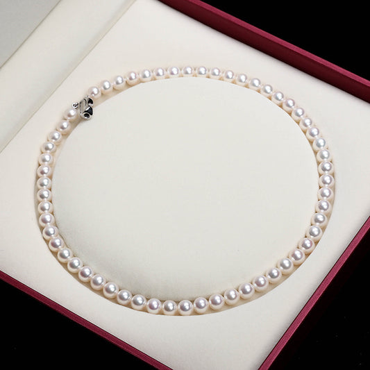 Tree of Life Studio spiritual pearl necklace for women displayed in a white cushioned box