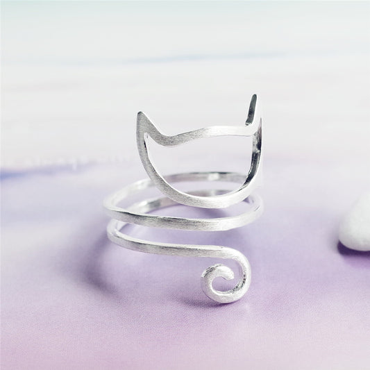 Sterling silver cat ring by Tree of Life Studio with open spiral design and minimalist cat face