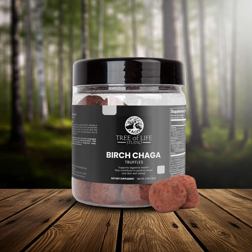 Tree of Life Studio premium chaga mushroom truffles in a clear jar with black lid on wooden surface