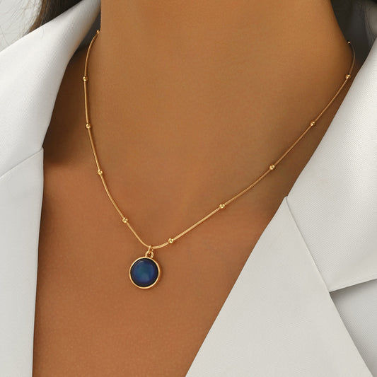 18k gold plated mood necklace with blue mood stone pendant on delicate gold chain by Tree of Life Studio